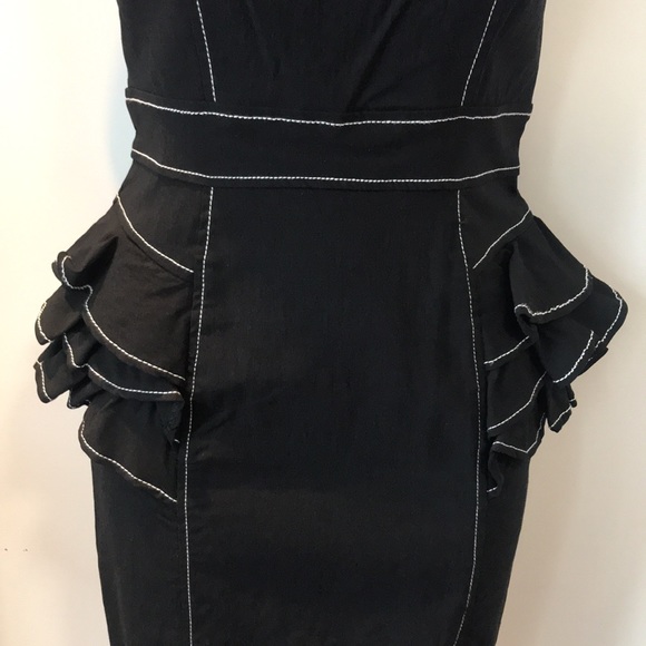 Bebe mechanical fabric peplum dress. - Picture 3 of 11